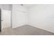Spacious bedroom with double door closet and carpeting at 2121 Rosewood Dr, Bartow, FL 33830