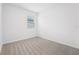 Well-lit bedroom with neutral carpet and window at 2121 Rosewood Dr, Bartow, FL 33830