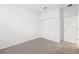 Bedroom with double door closet and window at 2121 Rosewood Dr, Bartow, FL 33830
