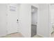 Inviting entryway with tile flooring and door to bedroom at 2121 Rosewood Dr, Bartow, FL 33830