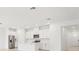 Modern kitchen featuring white cabinets, stainless steel appliances, and an island at 2121 Rosewood Dr, Bartow, FL 33830