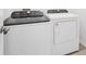Modern laundry room with Whirlpool washer and dryer at 2121 Rosewood Dr, Bartow, FL 33830