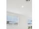 Living area featuring window and sliding glass doors at 2121 Rosewood Dr, Bartow, FL 33830