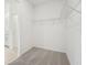 Large walk-in closet with wire shelving at 2121 Rosewood Dr, Bartow, FL 33830