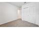 Bright bedroom with double door closet and neutral carpeting at 2125 Rosewood Dr, Bartow, FL 33830