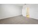 Spacious bedroom with carpet flooring and access to bathroom at 2125 Rosewood Dr, Bartow, FL 33830