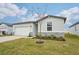 One-story house with stone accents and a two-car garage at 2125 Rosewood Dr, Bartow, FL 33830