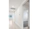 Bright hallway with tile flooring and access to other rooms at 2125 Rosewood Dr, Bartow, FL 33830