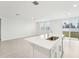 Modern kitchen island with white quartz countertop and stainless steel sink at 2125 Rosewood Dr, Bartow, FL 33830