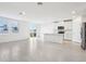 Bright kitchen features island, view of backyard, and stainless steel appliances at 2125 Rosewood Dr, Bartow, FL 33830
