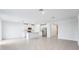 Open concept kitchen with island and stainless steel appliances at 2125 Rosewood Dr, Bartow, FL 33830