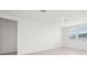 Bright and airy living room with wood-look floors and large windows at 2125 Rosewood Dr, Bartow, FL 33830