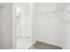 Spacious walk-in closet with wire shelving and neutral carpeting at 2125 Rosewood Dr, Bartow, FL 33830
