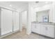 Modern bathroom with a double vanity, shower, and granite countertop at 2137 Rosewood Dr, Bartow, FL 33830
