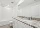 Bathroom with double vanity, granite countertop, and bathtub at 2137 Rosewood Dr, Bartow, FL 33830