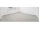 Well-lit bedroom with carpet flooring and an exterior view at 2137 Rosewood Dr, Bartow, FL 33830