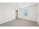 Bright bedroom with window, closet, and neutral walls at 2137 Rosewood Dr, Bartow, FL 33830
