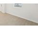 Room with tile floor and access to the kitchen and outside at 2137 Rosewood Dr, Bartow, FL 33830