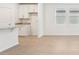 Bright dining room with tile floors and adjacent kitchen at 2137 Rosewood Dr, Bartow, FL 33830