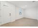 Bright foyer with wood-look tile floor and white walls at 2137 Rosewood Dr, Bartow, FL 33830