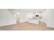 Spacious living room with tile floors and kitchen views at 2137 Rosewood Dr, Bartow, FL 33830