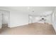 Open living room showcasing tile floors and access to other rooms at 2137 Rosewood Dr, Bartow, FL 33830