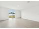 Living room with sliding glass doors leading to backyard at 2137 Rosewood Dr, Bartow, FL 33830