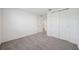 Spacious bedroom featuring grey carpet and built-in closet at 2321 Citrus Bloom Dr, Bartow, FL 33830