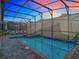 Inviting pool and spa area with covered patio at 4563 Narrative Ln, Kissimmee, FL 34746
