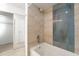 Updated bathroom with a new bathtub and stylish tile at 1704 Ison Ln, Ocoee, FL 34761