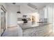 Modern kitchen with granite countertops, stainless steel appliances, and ample cabinet space at 1704 Ison Ln, Ocoee, FL 34761