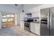 Enjoy lake views from this updated kitchen, featuring granite counters and stainless steel appliances at 1704 Ison Ln, Ocoee, FL 34761
