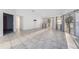 Open living space with tile floors, lots of natural light, and sliding doors to the backyard at 1704 Ison Ln, Ocoee, FL 34761