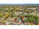 A bird's eye view of property highlighting the layout, pool, and surrounding neighborhood at 4317 Ne 12Th St, Ocala, FL 34470