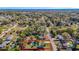 Aerial view of property highlighting the layout, pool, and surrounding neighborhood at 4317 Ne 12Th St, Ocala, FL 34470