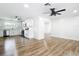 Open concept kitchen with white cabinets, stainless steel appliances at 4317 Ne 12Th St, Ocala, FL 34470