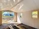 The interior of a shed with a view of the backyard, wood and multiple windows at 4317 Ne 12Th St, Ocala, FL 34470