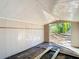 Interior view of the shed in need of repair, offering potential for various uses and customization at 4317 Ne 12Th St, Ocala, FL 34470