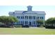 Beautiful community building with classic architecture and well-maintained landscaping at 5342 Horton Ln, Orlando, FL 32814