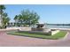 Beautiful water fountain and outdoor patio with lake views, perfect for relaxing at 5342 Horton Ln, Orlando, FL 32814