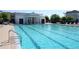 Stunning swimming pool with lounge chairs and a bright clubhouse, perfect for relaxing and enjoying the community amenities at 5342 Horton Ln, Orlando, FL 32814