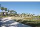 Paved walking path overlooking serene water feature, inviting residents to enjoy nature and recreation at 5342 Horton Ln, Orlando, FL 32814