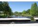 Community water feature with stepping stones and lush landscaping, offering a serene environment at 5342 Horton Ln, Orlando, FL 32814