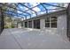 Large screened-in patio with ample space for entertaining and enjoying the outdoors at 571 Masalo Pl, Lake Mary, FL 32746