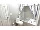 Well lit bathroom with tub/shower and toilet at 1660 Killean Ct, Apopka, FL 32712