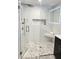 Updated shower with glass door, rainfall shower head, and built in niche at 1660 Killean Ct, Apopka, FL 32712
