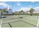 Basketball court with hoops, fencing, and benches at 2007 Disney Mgm Studio Ct, Kissimmee, FL 34746