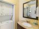 Bathroom with stackable washer and dryer at 2007 Disney Mgm Studio Ct, Kissimmee, FL 34746