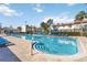Community pool with plenty of lounge chairs for residents to relax and enjoy at 2007 Disney Mgm Studio Ct, Kissimmee, FL 34746