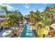 Relaxing lazy river winding through lush landscaping at 2007 Disney Mgm Studio Ct, Kissimmee, FL 34746